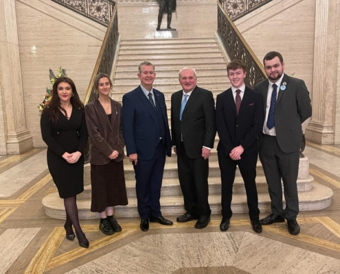 Bertie Ahern with Cara Hunter MLA Aine Kennedy Hist Auditor Edwin Poots Conor Muldoon and Daniel Toft Literific President at the recent debate with students from Trinity College and Queens University in Stormont Parliament